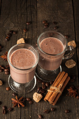 Chocolate, coffee, milk, banana shake on wooden background. Smoothie with cookies. Milkshake. Protein diet. Healthy food concept.
