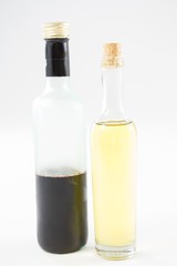 Green and purple olive oil bottles