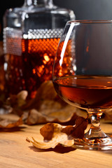 Brandy and dried up oak leaves .