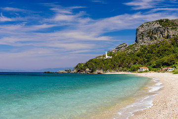 Fototapeta na wymiar Potami beach - scenic sandy beach with beautiful blue water, Samos island, Greece. Travel concept