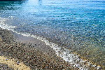 Beautiful sea view. A calm sea by the shore. Clean pebble beach. The Adriatic. Montenegro