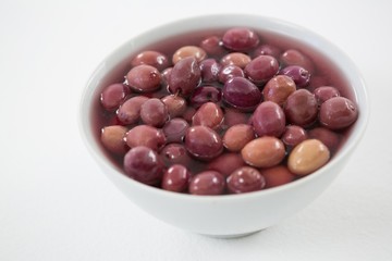 Close-up marinated olives in bowl