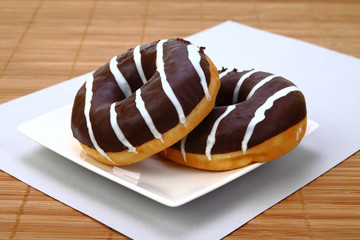 Delicious donut with chocolate icing
