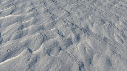 Fototapeta premium The snow froze as waves,strong wind.