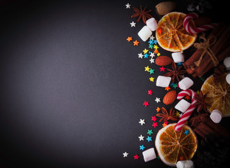 New Year or Christmas background with orange slices of marshmallow space for text, selective focus