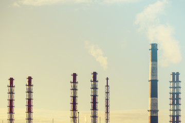 Chimney of the old factory. Environmental pollution