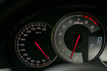 Tachometer and speedometer in the new car.