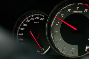 Speedometer and tachometer of the sports car.