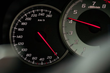 Speedometer and tachometer of the sports car.