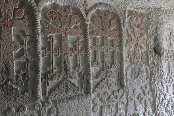 Traditional Armenian stone crosses and rocks around the Geghard monastery