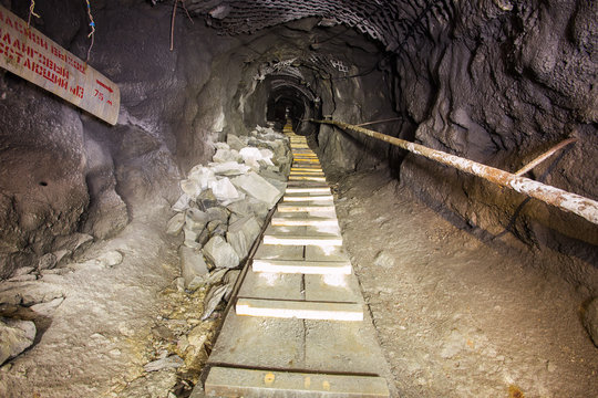 Underground abandoned old mine shaft iron copper gold ore tunnel gallery incline with stairs