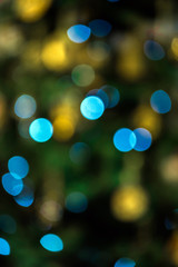 Christmas lights background with bokeh effect, defocused new year backdrop