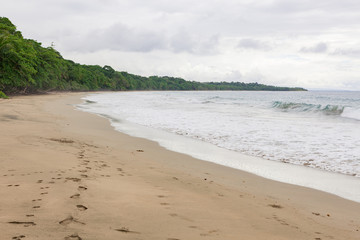 Fototapeta na wymiar Tropical paradise beach in Costa Rica at cloudy day