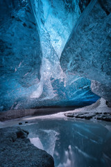 Inside an ice cave in Vatnajokull, Iceland. The ice is thousands of years old and so packed it is harder than steel and crystal clear.
