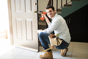 Handsome handyman doing some work