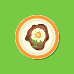 Fried meat with egg and parsley on the plate