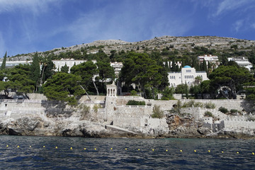 wild coast of croatian town dubrovnik from a boat