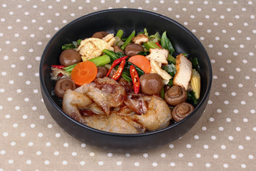 Fried big noodle topped mixed vegetables for organic food.