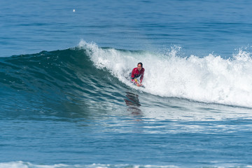 Bodyboarder surfing ocean wave