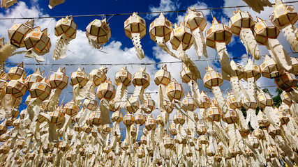 hanging lanterns include names in wat to merit and exorcise on Loy Krathong festival in Thailand