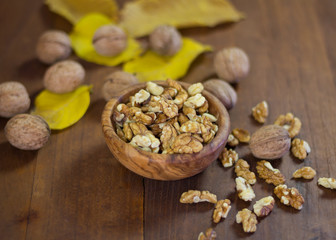Peeled walnuts in a wooden bowl