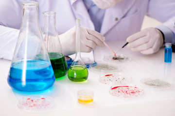 Male doctor working in the lab on virus vaccine