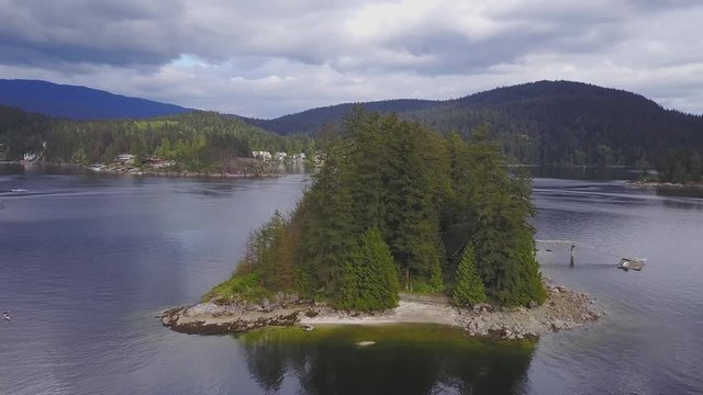 Aerial 4k drone view of a park in Deep Cove during a vibrant springtime day. Taken in North Vancouver, British Columbia, Canada.
