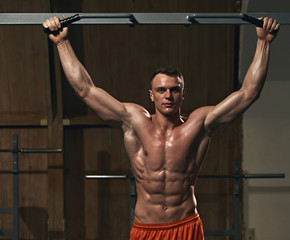 Athlete doing pulling-up