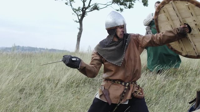 Viking protects his woman