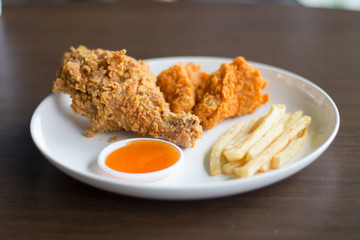 Fried chicken fried potatoes select focus or blurred