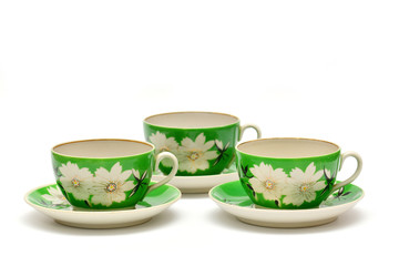 Cups and saucers, tea set on white background
