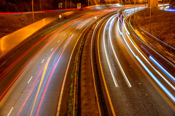 Fototapeta na wymiar Night View of UK Motorway Highway Traffic