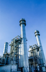 Industrial view at oil refinery plant form industry zone with cloudy sky	