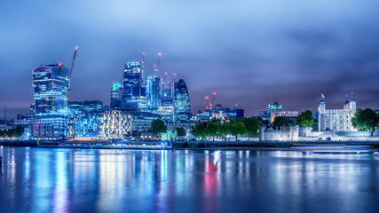 Fototapeta na wymiar London, the United Kingdom: the Downtown andTower from the River Thames at night