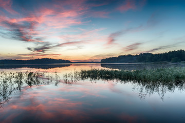 Beautiful nature background. Colorful sunrise. Dramatic sky.