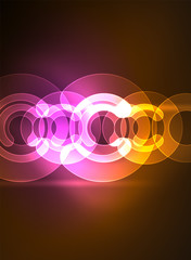Round glowing elements on dark space, abstract background
