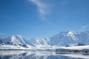 Huge ice flows on a mountain range in Antarctica.