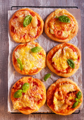 Homemade mini pizzas with different stuffing