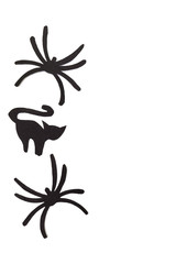 Silhouettes of black cats and spiders carved out of black paper are isolated on white