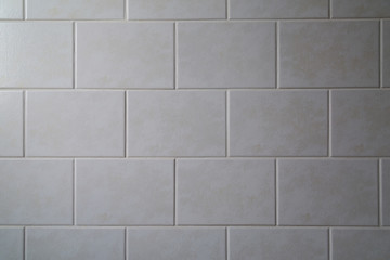 background of white tiled wall
