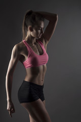 studio sport young dark background isolated standing female