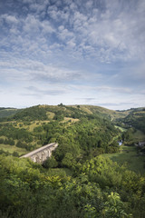 Colorful landscape image of Headstone Viaduct and Monsal Head in Peak District in Summer