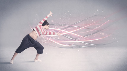 Obraz na płótnie Canvas Funky urban dancer with glowing lines