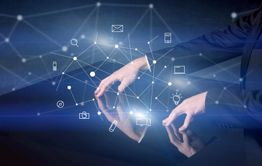 Hands touching interactive table