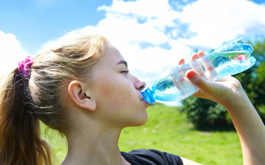 Young girl drink water