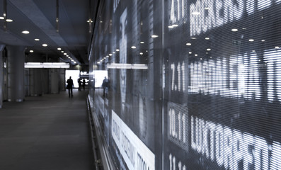 Abstract urbanistic concept. LED display wall into underground crossing.