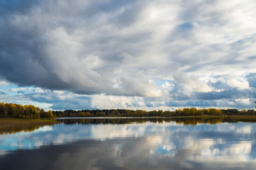 The landscape is idyllic reflection of clouds in water sometimes fall. Wildlife of Europe autumn.