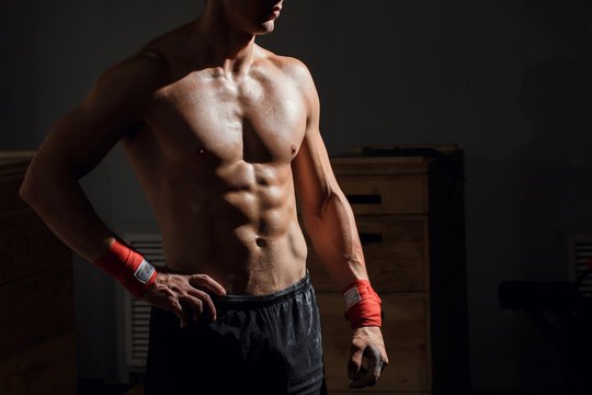 Strong Athletic Man Fitness Model Torso showing six pack abs