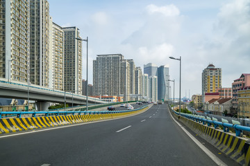 Fototapeta na wymiar Urban construction roads and skyline