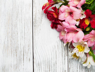 Naklejka na ściany i meble alstroemeria flowers on a table